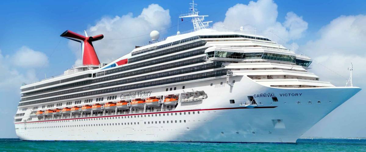 GEORGE TOWN, GRAND CAYMAN ISLAND - FEBRUARY 26: Carnival Cruise Line, cruise ship Carnival Victory Sails from Port George Town on February 26, 2013.