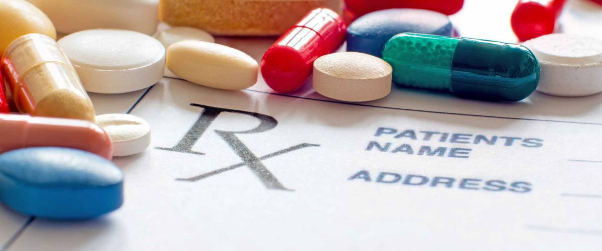 Prescription pills with prescription paper