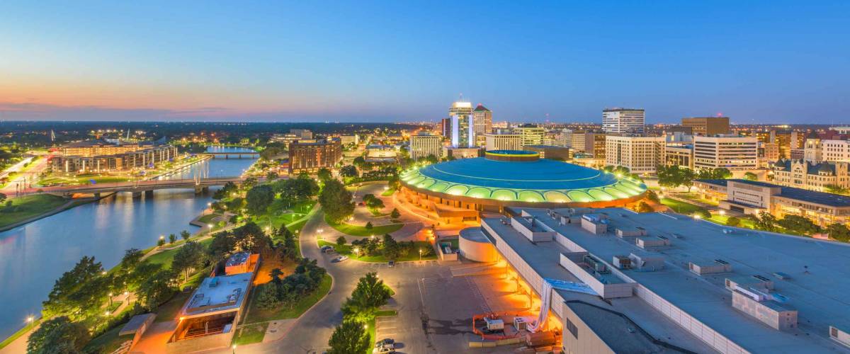 Wichita, Kansas, USA downtown skyline at dusk.