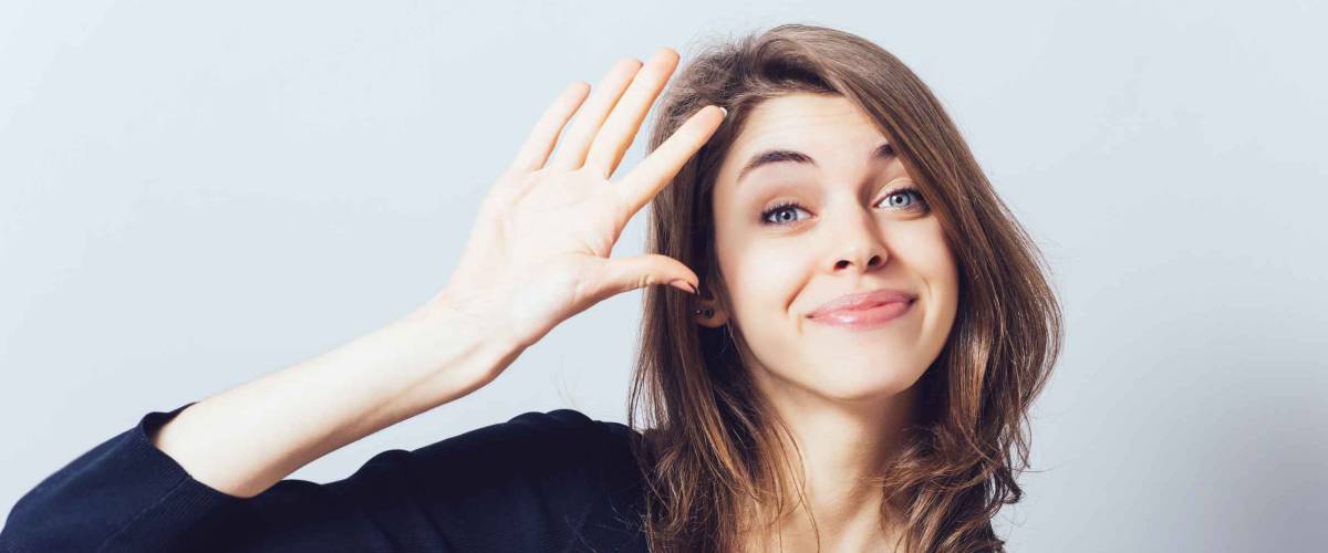 girl showing hello
