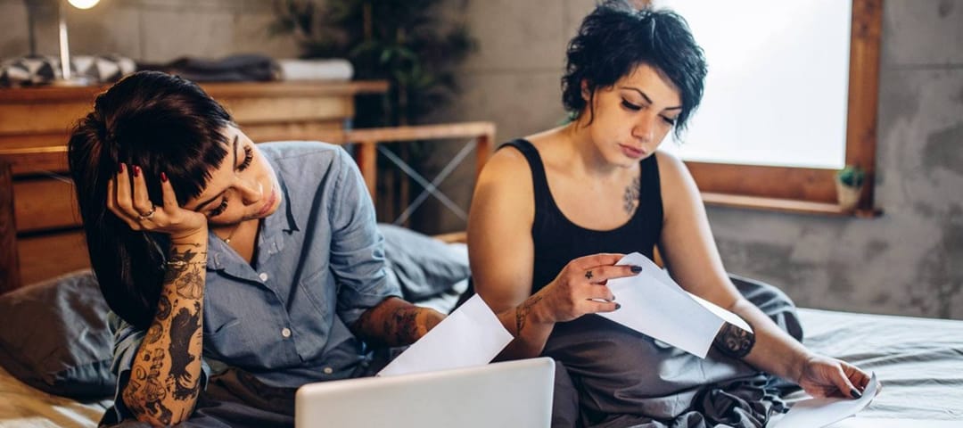 Women going through their bills
