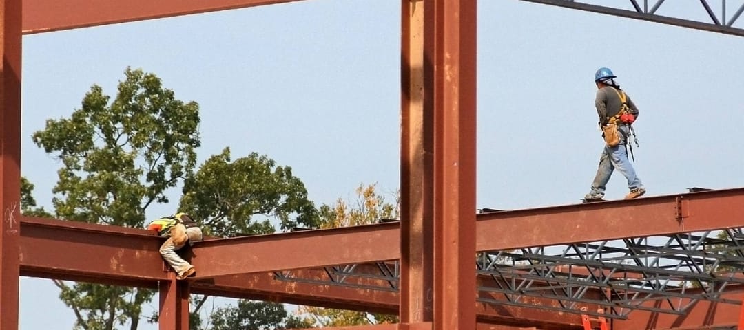 Unidentified steel workers on construction site
