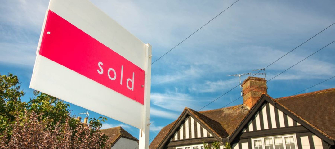 Estate agency sold sign