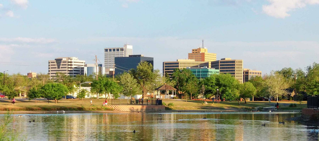 Downtown Midland, Texas on a Sunny Day as Seen Over the Pond at Wadley Barron Park