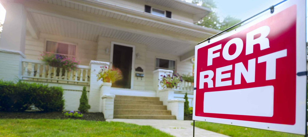 Home For Rent Sign in Front of Beautiful American House