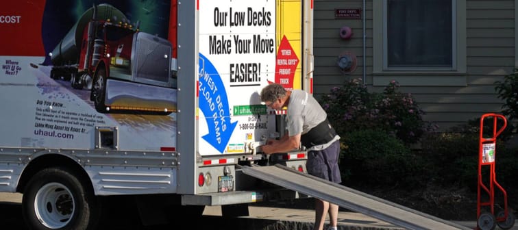 Man locks up a U-Haul truck.