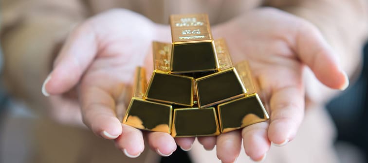 Hands holding gold