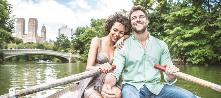Happy couple having fun on a boat