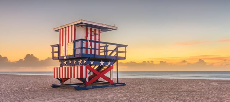 Miami Beach, Florida, USA sunrise and life guard tower.