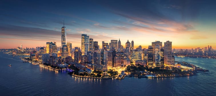 New York City panorama skyline at sunrise. Manhattan office buildings