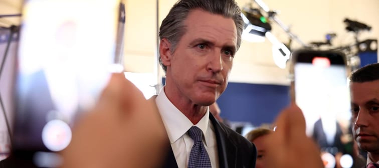 California Gov. Gavin Newsom speaks with reporters following the Fox Business Republican Primary Debate at the Ronald Reagan Presidential Library in Simi Valley, California, Sept. 27, 2023.
