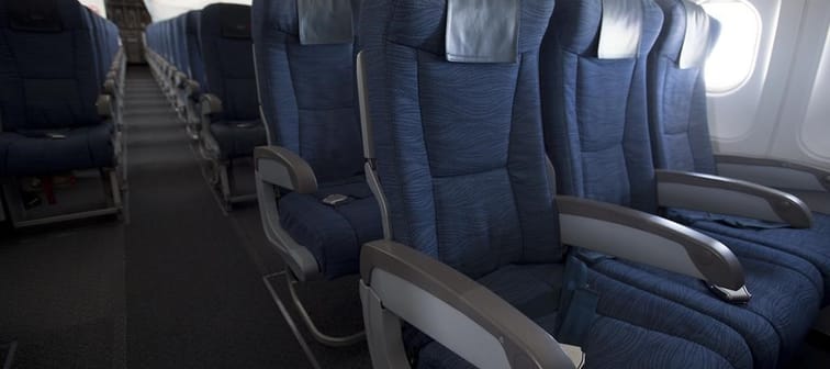 Air Canada is pressing pause on a new seat selection fee after social media backlash against the days-old policy. Airline seats are seen during a flight from Vancouver to Calgary on Tuesday, 