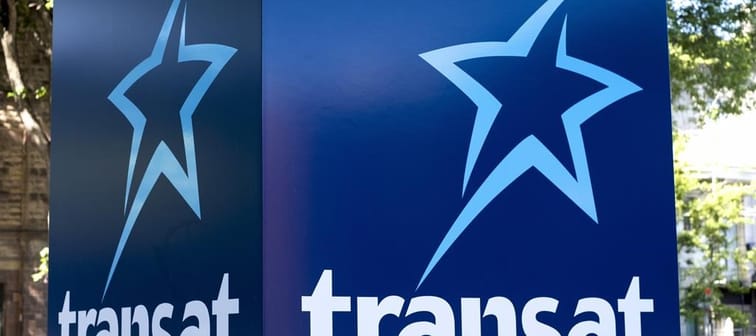 Travel company Transat A.T. Inc. says it expects to fall short of its financial guidance for the year. An Air Transat sign is seen in Montreal on May 31, 2016. 