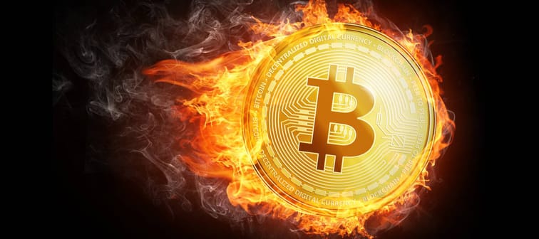 Bitcoin illustration in flames