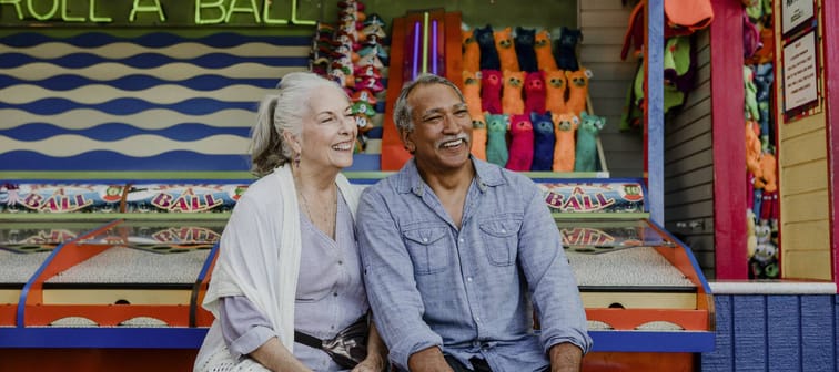 Seniors smiling at a fair