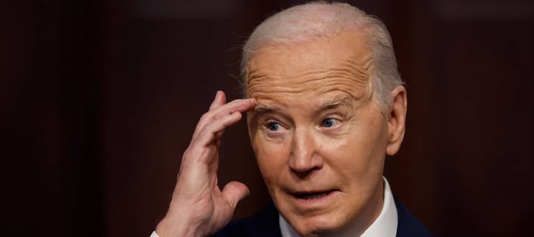 Biden touching his eyebrow looking stressed