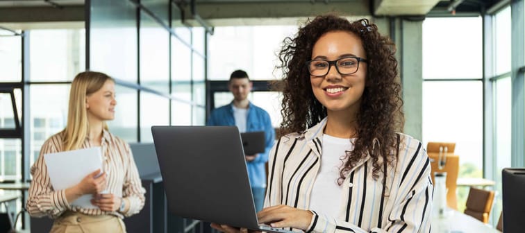 millennials working in an open concept office environment