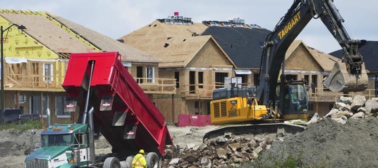 The Canada Mortgage and Housing Corp. says construction of new homes in Canada's six largest cities remained stable at near all-time high levels last year, driven by a surge of new apartment 
