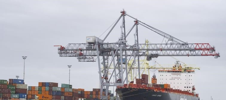 A container ship is loaded in the Port of Montreal, Tuesday, Sept.19, 2023. At least one major transportation company is rerouting cargo away from the Port of Montreal over fears of a potenti