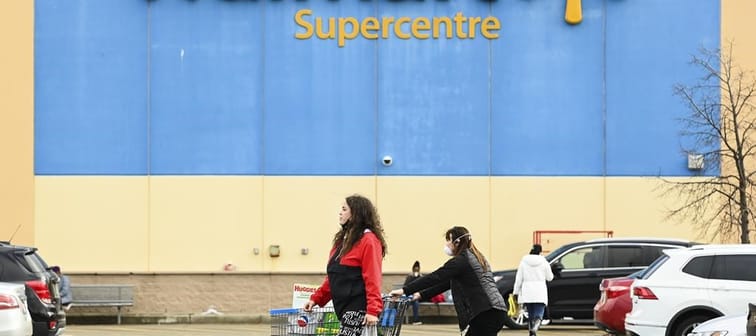 Walmart Canada is launching a national pilot program for customers to recycle their reusable shopping bags.People leave a Walmart store in Mississauga, Ont., Thursday, Nov. 26, 2020. 