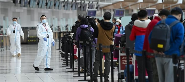 People line up and check in for an international flight at Pearson International Airport during the COVID-19 pandemic in Toronto on Wednesday, Oct. 14, 2020. The federal government and a cons