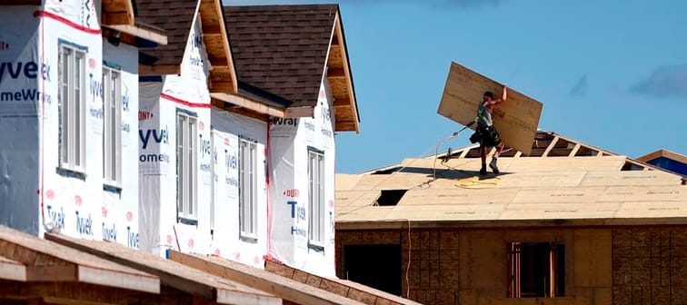 HomeStars' annual Reno Report for 2023 found the average household spend on renovations was $12,300, down from $13,000 in 2022 and forecast to fall to $10,264 this year. A builder carries a s