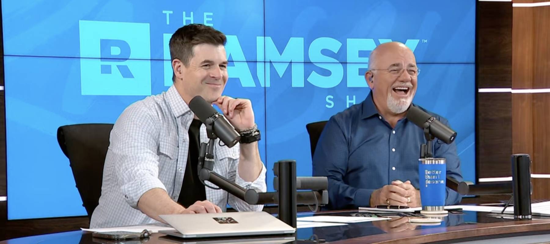 John Delony and Dave Ramsey laughing.