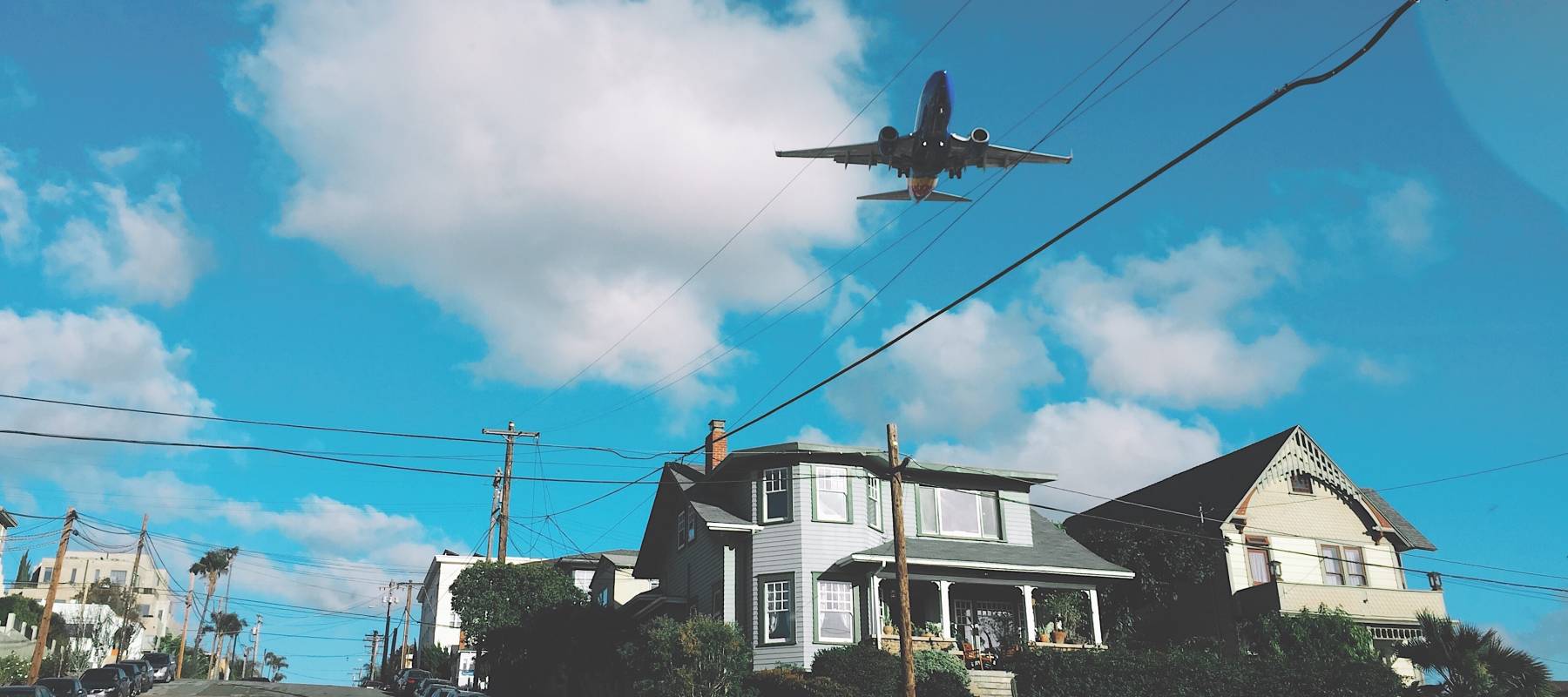 Plane flying over a San Diego, California neighborhood.
