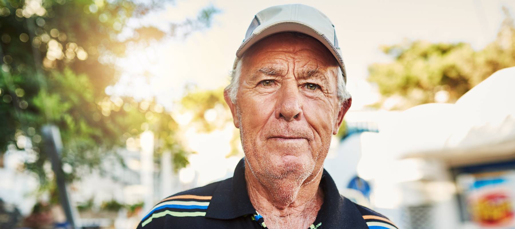 Older man looking at camera