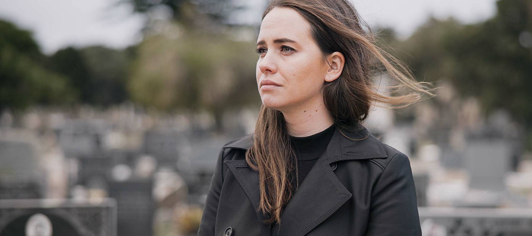 Woman grieving after a death in the family.