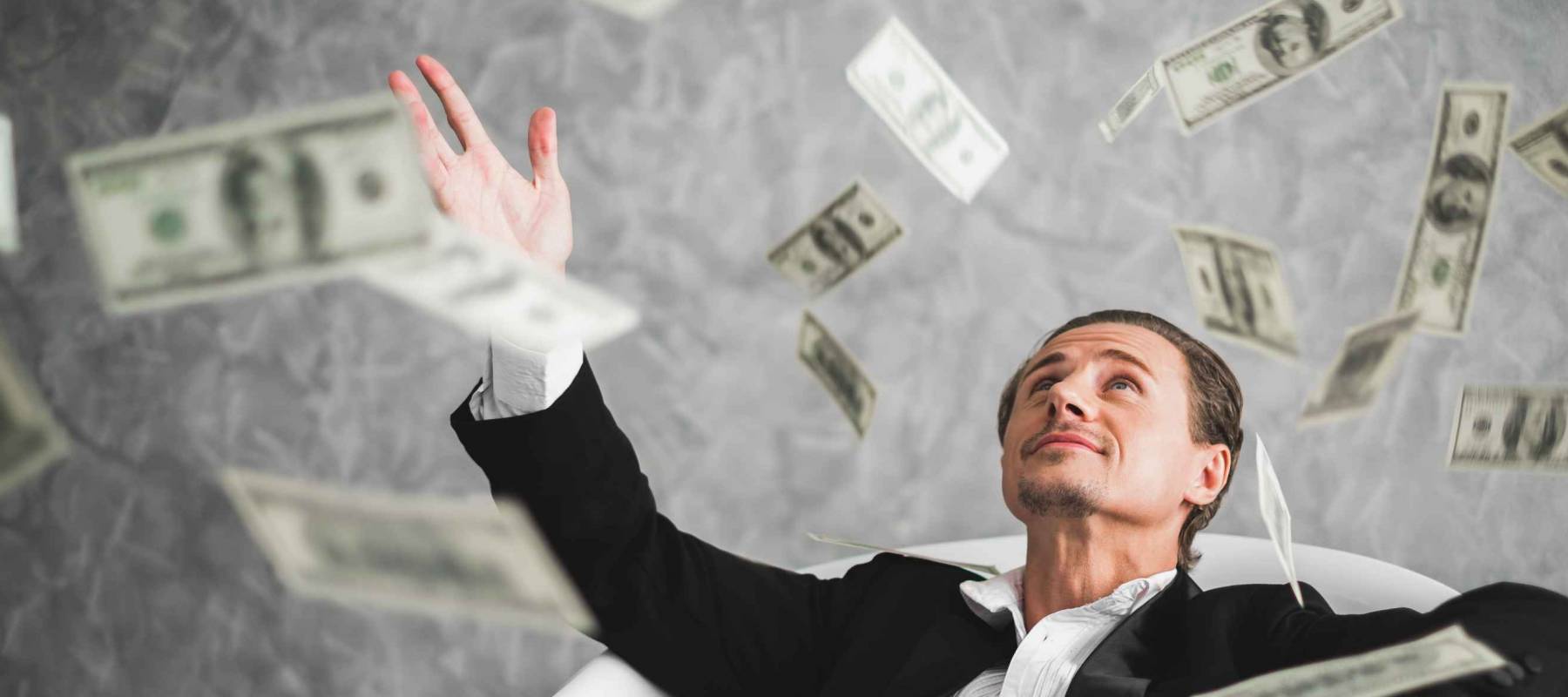 Business man with many banknotes