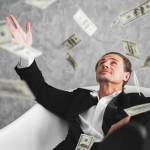 Business man with many banknotes