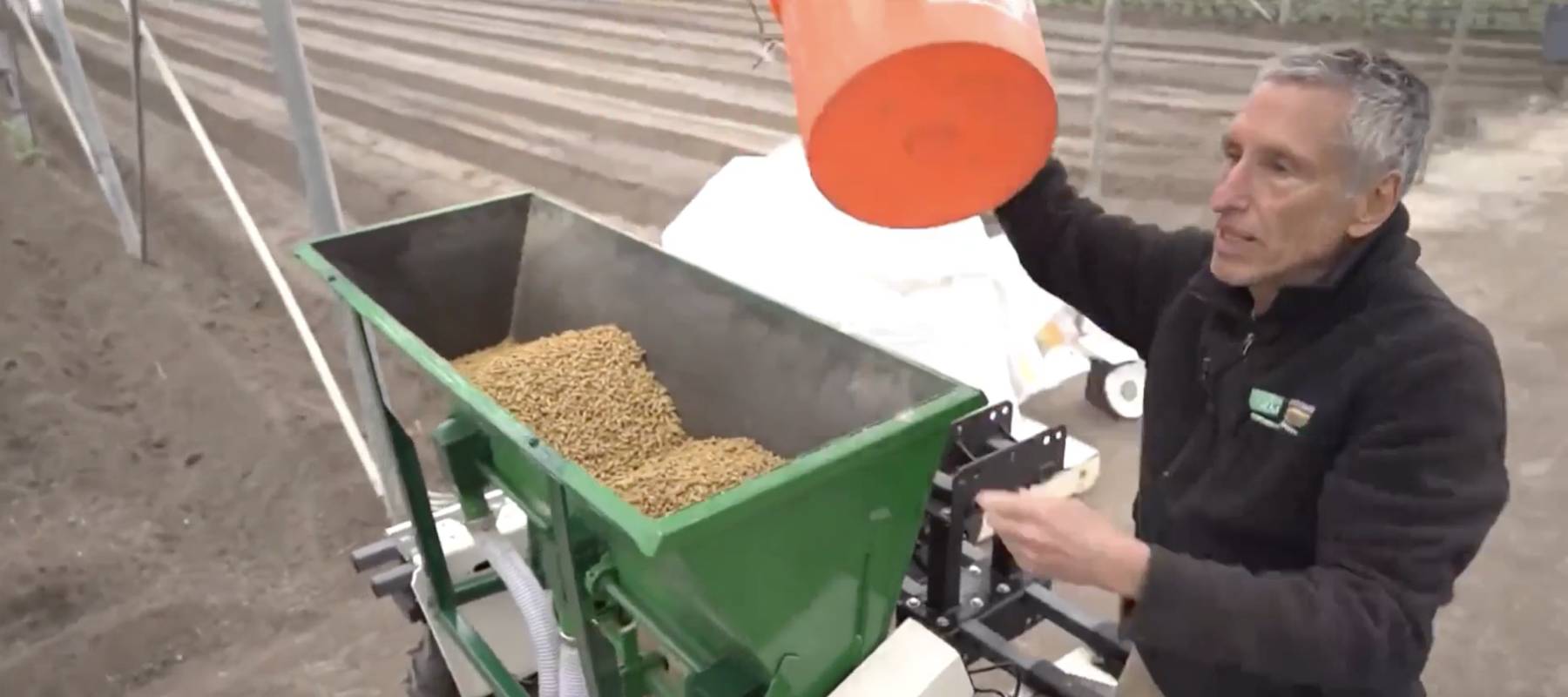 California farmer spreading seed on his farm, while explaining why automated vehicles would be a benefit.