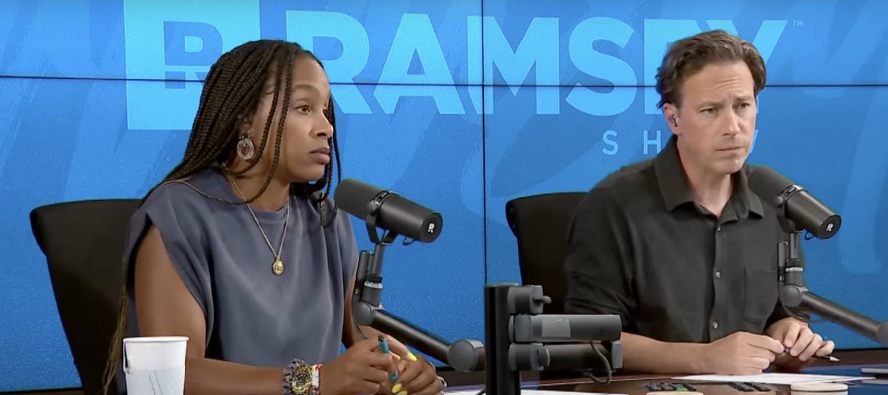 Cohosts Jade Warshaw and Ken Coleman listen to a caller's predicament.