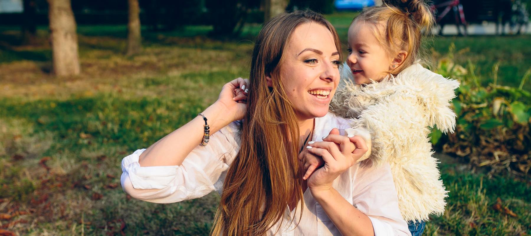 Mon and her baby playing in the park