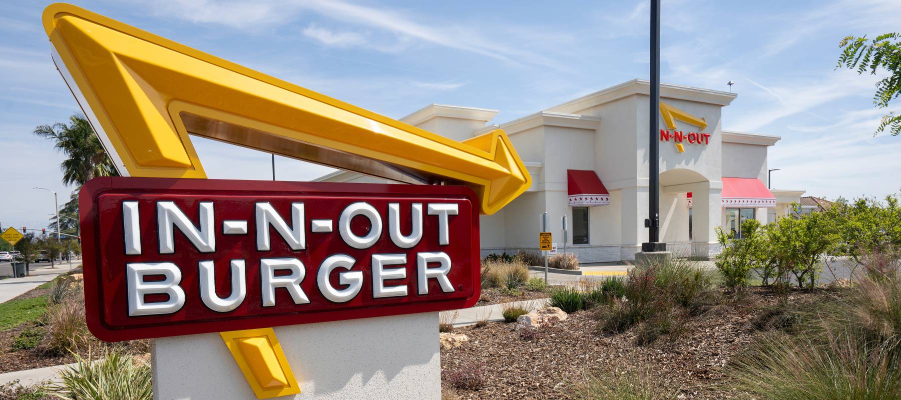 Elijah Obeng says In-N-Out fired him after he refused to remove his culturally significant sideburns.