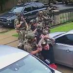 Home surveillance footage obtained by NBC DFW shows local and federal authorities execute a search warrant at a home in Dallas.