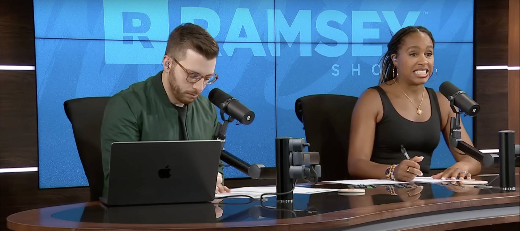 Co-host Jade Warshaw reacting to caller's news of taking out a high-interest bridge loan.