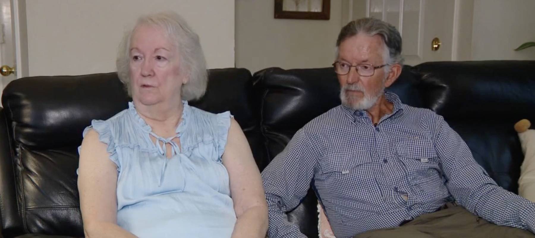 Paul Schendel's family sit on couch and discuss the scam resulted in a lost of $6,800.