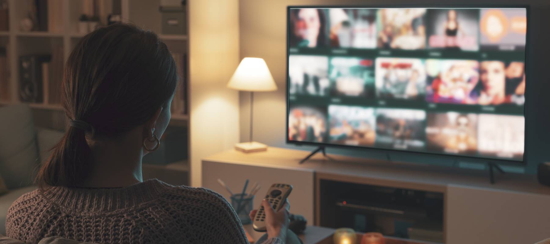 Woman streaming tv shows online.