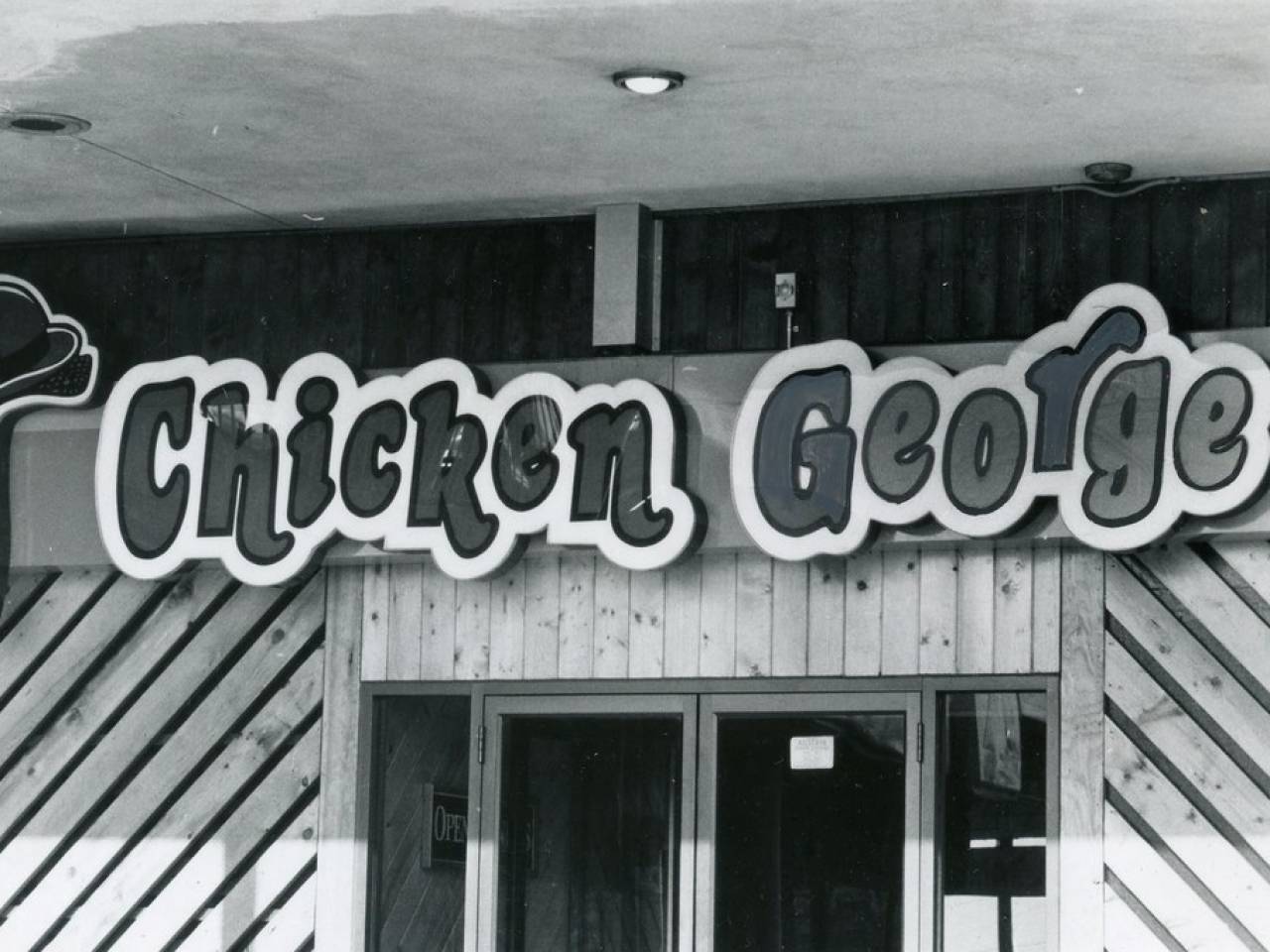 Black and white logo of Chicken George