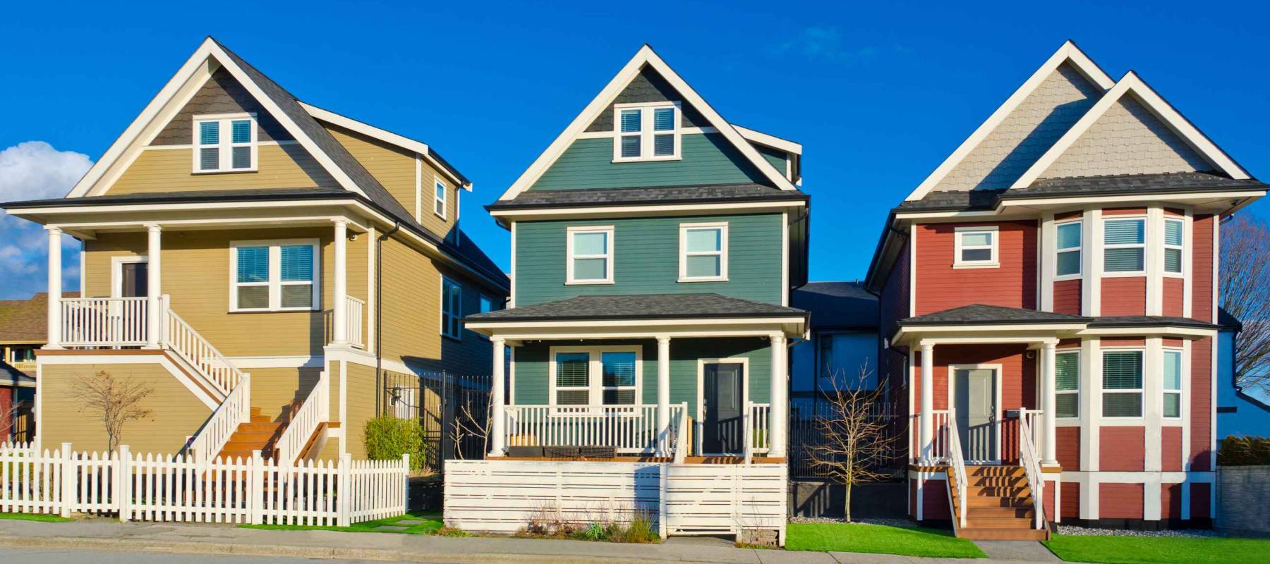 Bright and colorful line of single homes in great neighborhood. The homes  in north America. Vancouver.