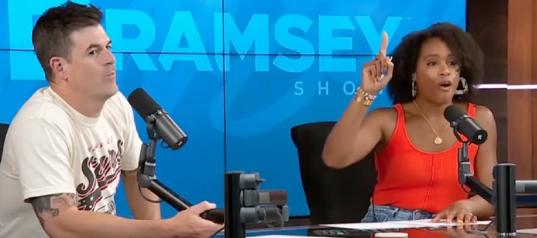 The Ramsey Show cohosts speaking on camera.