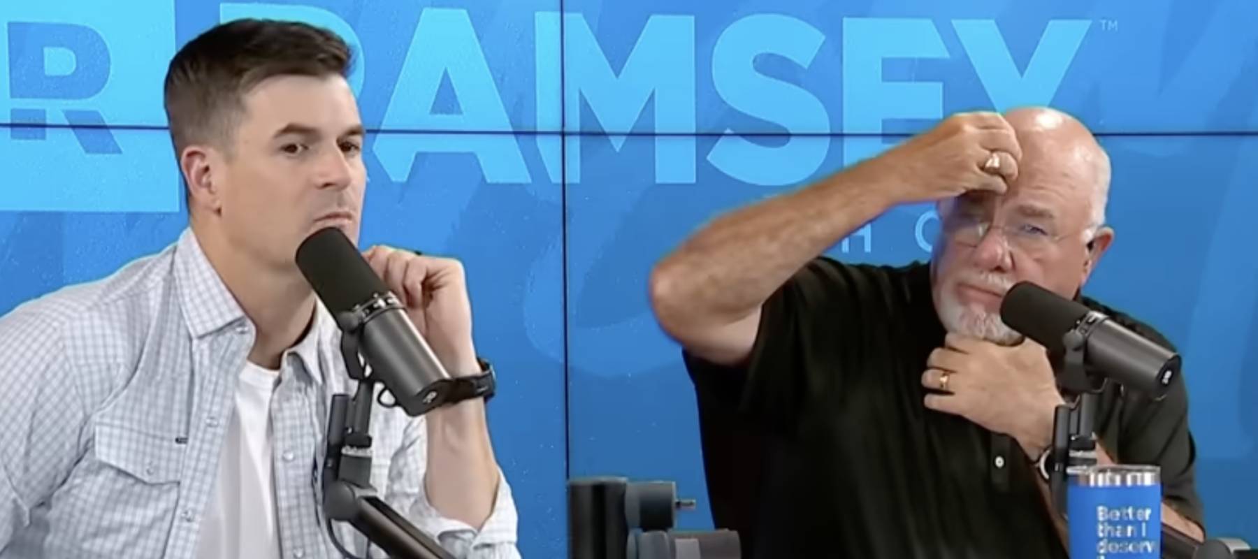Dave Ramsey and co-host Dr. John Delony look concerned hearing about woman trapped in abusive situation.