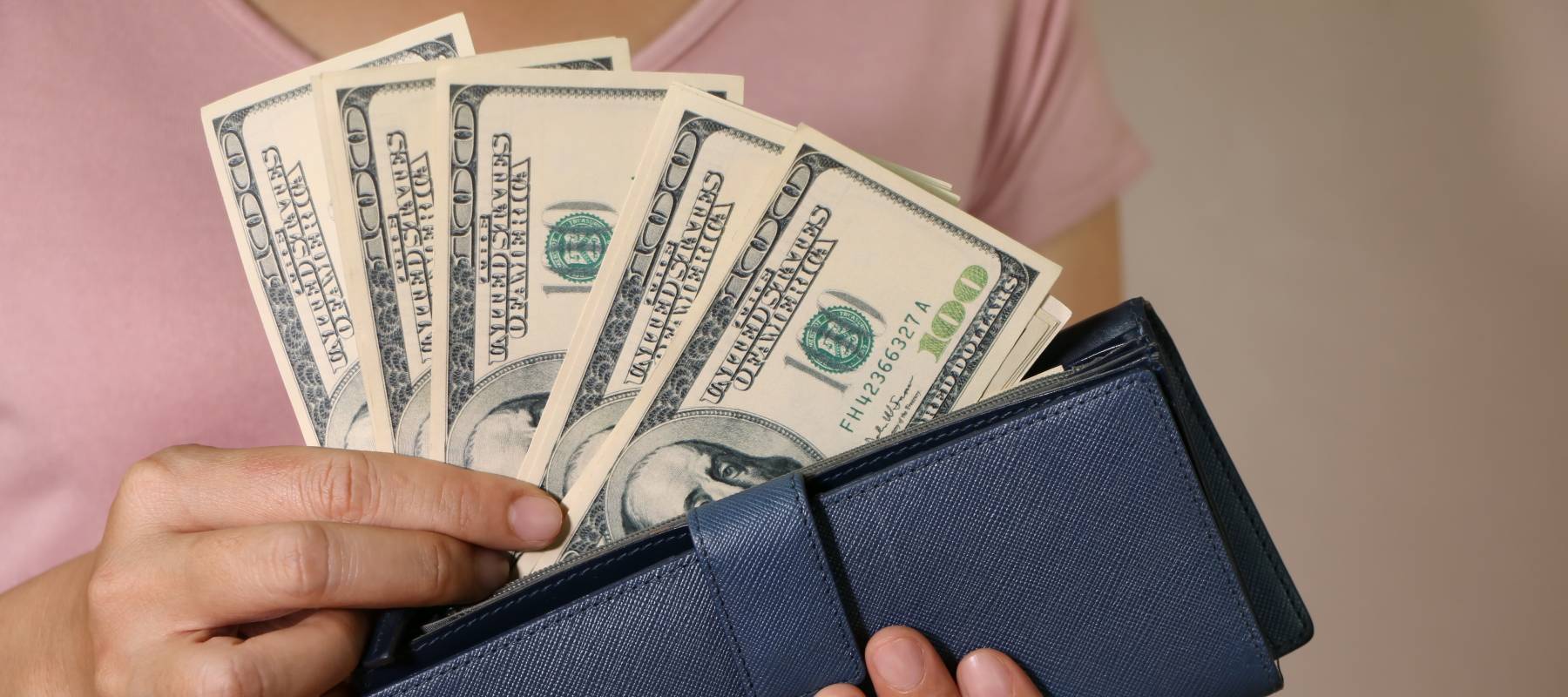 Hands holding money