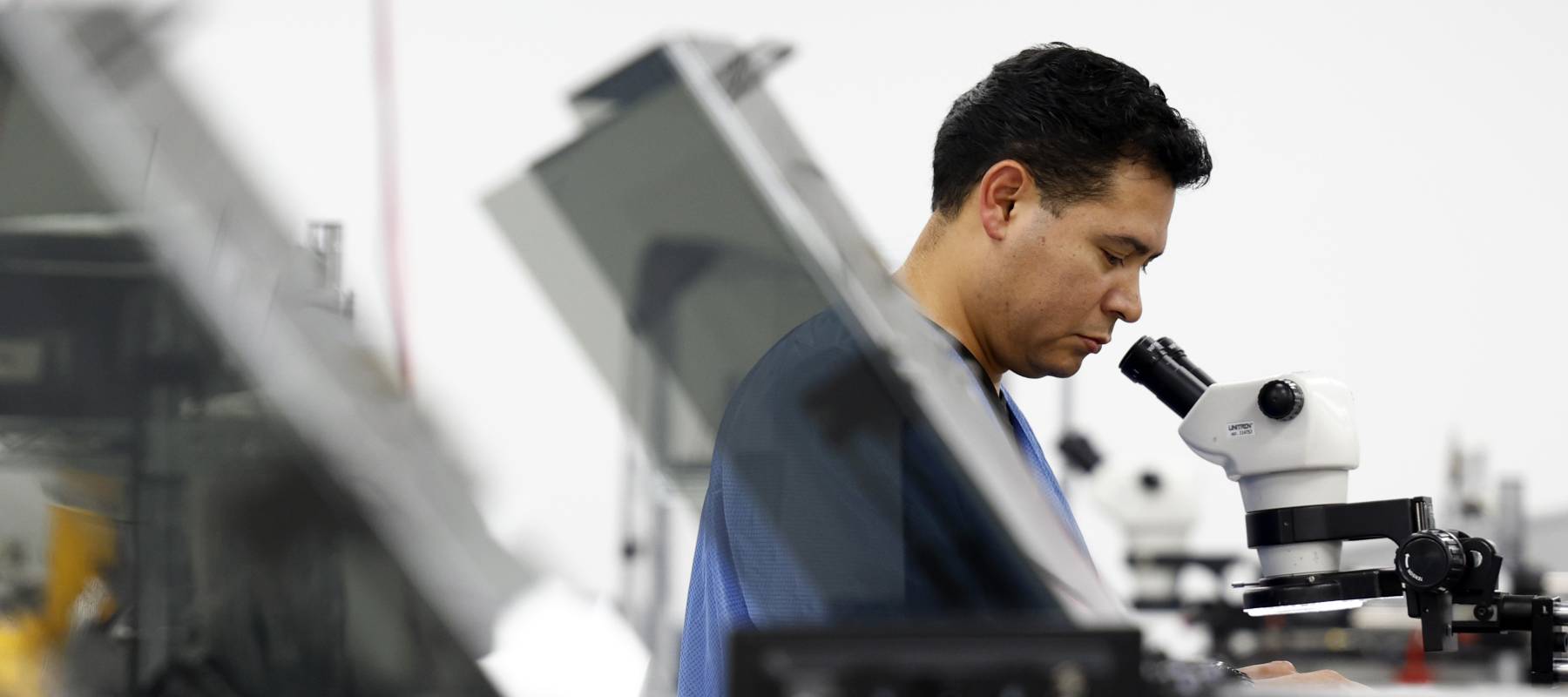 A technician works in a lab at Remtec.