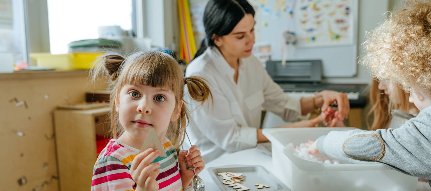 A child learning at a day care.