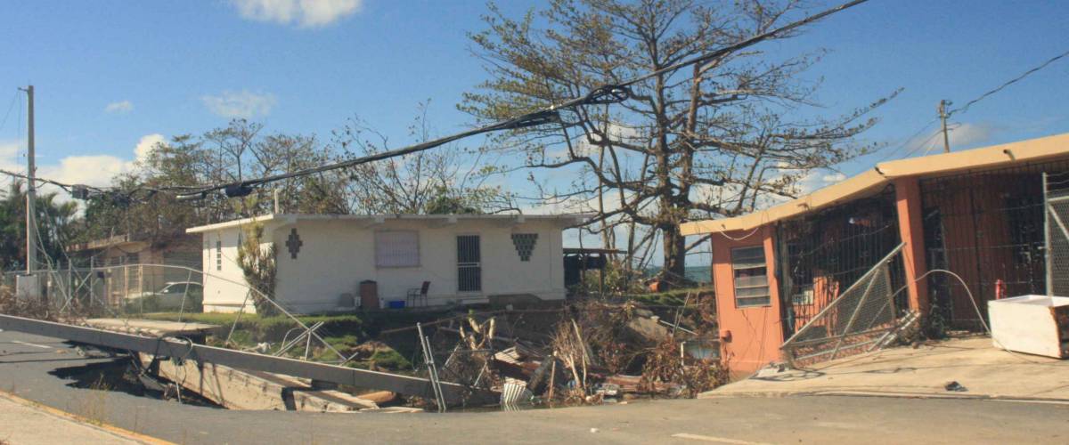 House falling through sinkhole