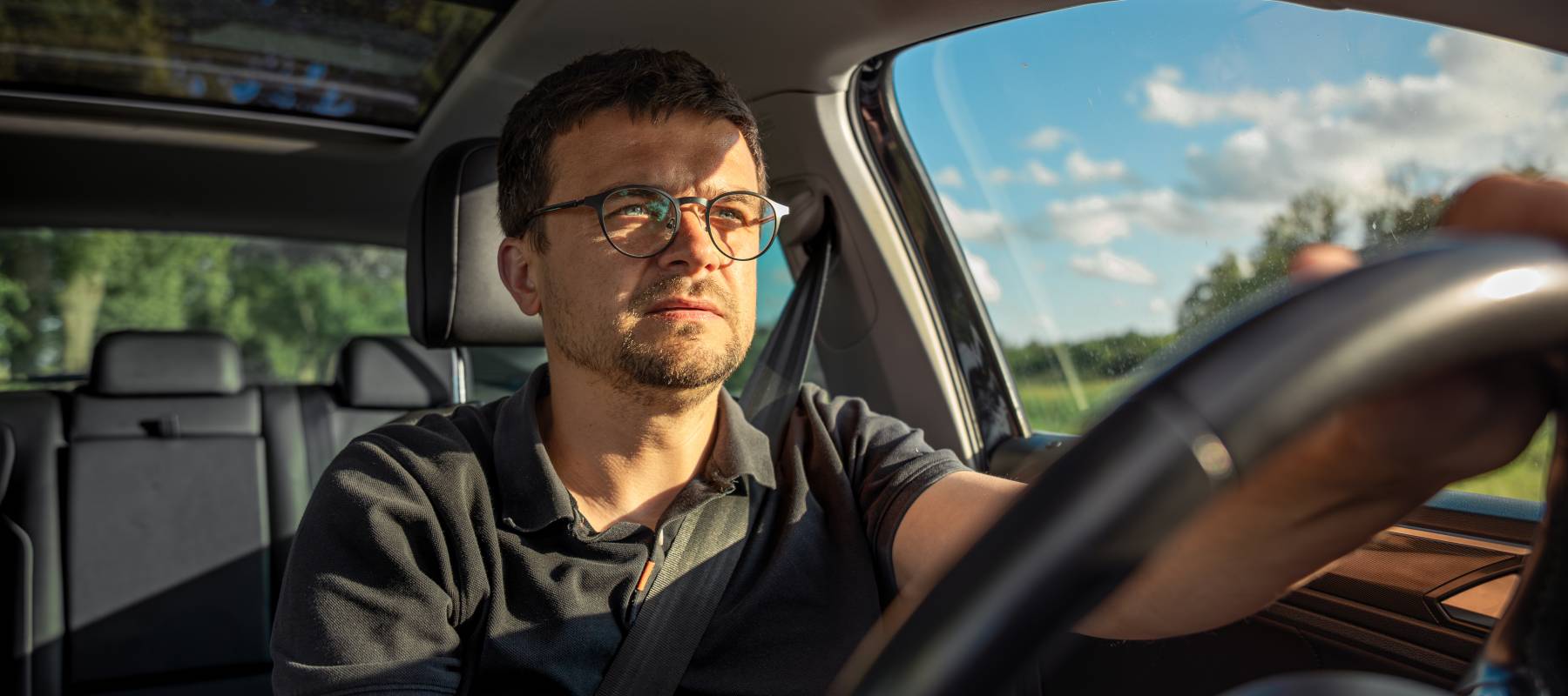 Driver in car interior