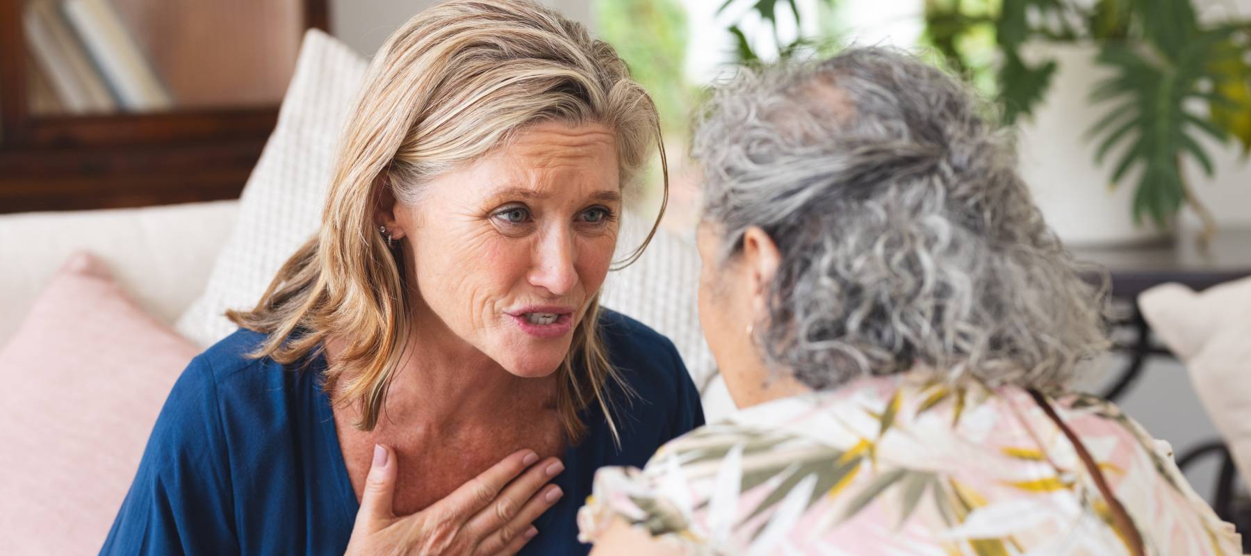 A woman confronts another woman.